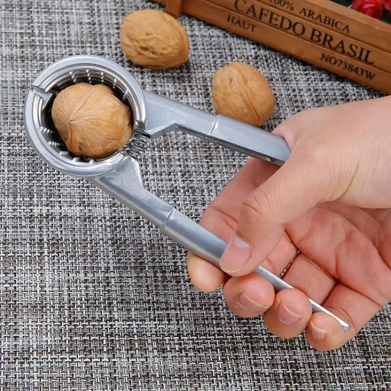 Effortlessly Crack Nuts with the Silvery Metal Walnut Clip – Your Multi-Functional Kitchen Companion for Hazelnuts and Chestnuts!